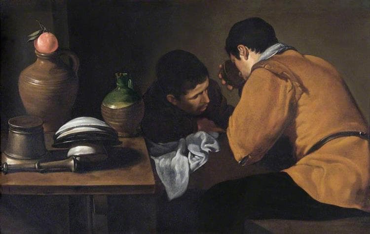 Two Young Men Eating At A Humble Table